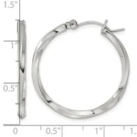Polished silver-toned hoop earrings with a twisted surface texture, shown from front and side views with a measurement scale indicating approximately one inch diameter.