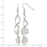 A pair of silver-tone dangle earrings with twisted oval loops above polished disc charms, displayed on a measurement ruler.