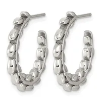 A pair of silver-toned chunky oval hoop earrings with a textured surface and polished oval links, shown from the front.