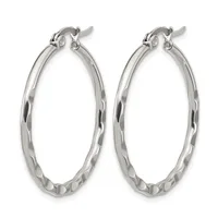 A pair of silver-toned hoop earrings with a twisted or textured surface finish, displayed against a white background.