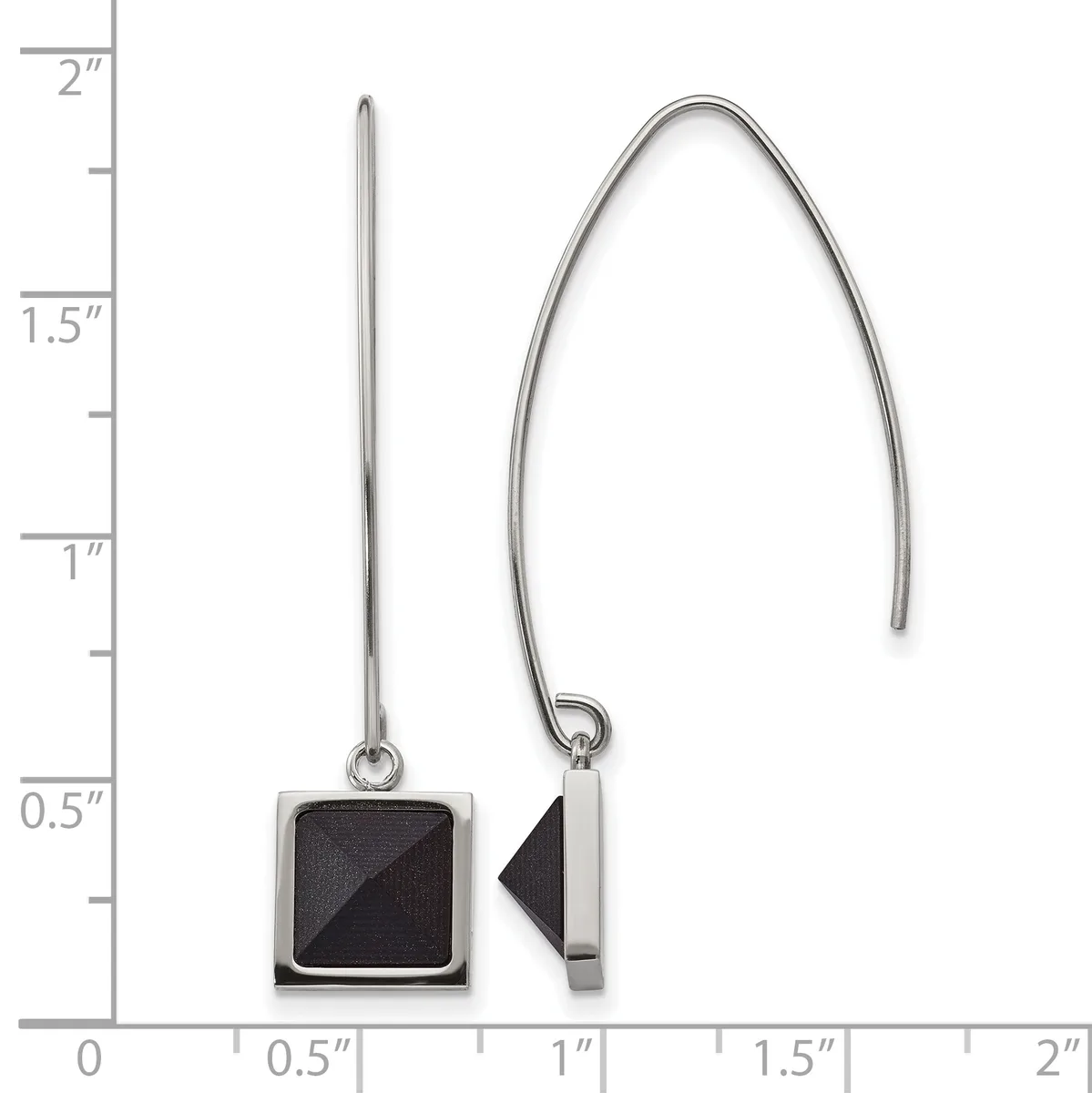 A pair of silver drop earrings with black square pendants shown against a ruler measuring approximately two inches in length.
