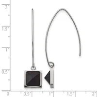 A pair of silver drop earrings with black square pendants shown against a ruler measuring approximately two inches in length.