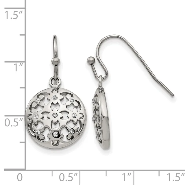 A pair of silver filigree circular drop earrings with rhinestone accents shown next to a measurement scale.