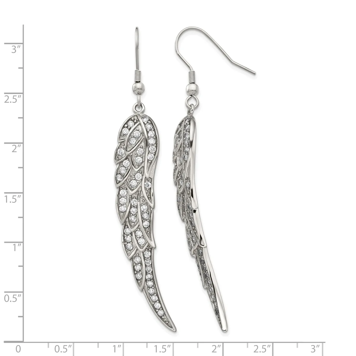 Pair of silver-tone feather-shaped dangle earrings with crystal embellishments and hook-style ear wires, displayed against a measurement ruler.