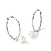 Pair of silver-toned hoop earrings with white pearl charms hanging from the bottom, displayed against a white background.