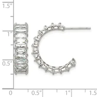 A pair of silver hoop earrings set with rectangular clear crystals arranged in a curved pattern, shown with a measurement scale indicating they are approximately one inch tall.