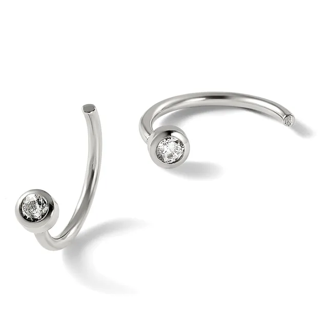 Two silver curved cuff bracelets with round diamond settings at the ends, displayed against a white background.