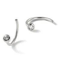 Two silver curved cuff bracelets with round diamond settings at the ends, displayed against a white background.
