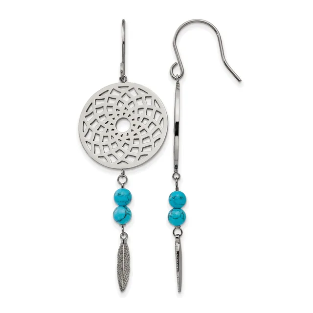 A pair of silver dangle earrings with circular filigree disc tops, turquoise beads, and small feather charms hanging from French hook wires.