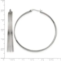 Two silver-toned metal earrings displayed against a ruler: a tassel-style drop earring and a polished hoop earring, each approximately 2.5 inches long.