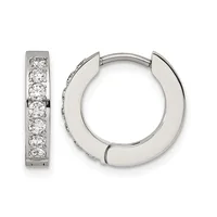Pair of silver-tone huggie hoop earrings with channel-set round cubic zirconia stones along the front surface, shown from front and side angles.