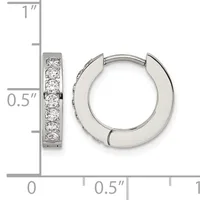 A pair of silver hoop earrings with channel-set round diamonds, shown with a measurement scale indicating approximately one inch in height and half an inch in width.