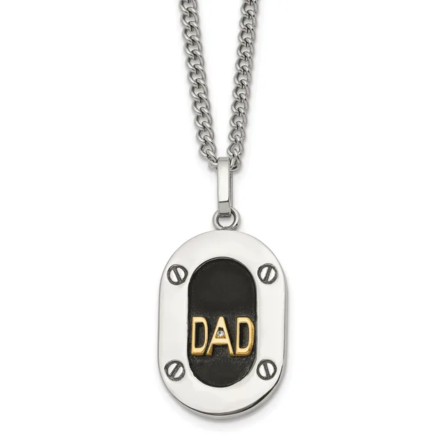 Silver pendant with black oval center displaying "DAD" in gold lettering, suspended from a silver curb chain.