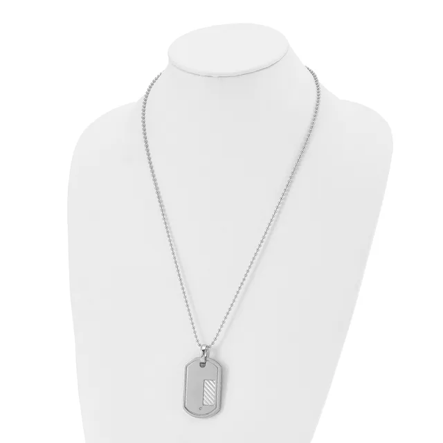 Silver-toned stainless steel dog tag pendant necklace displayed on a white mannequin bust, featuring a rectangular tag with diagonal line detailing and a fine chain.