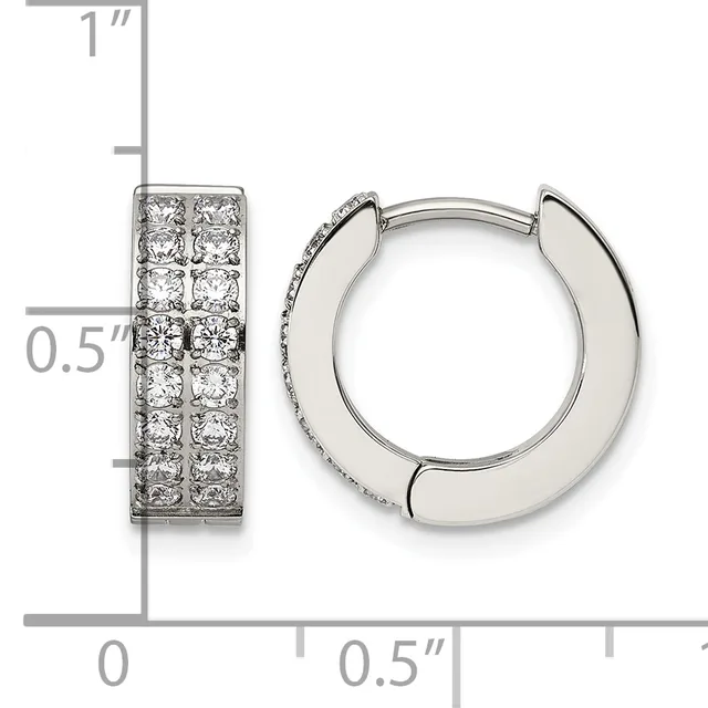 Pair of silver hoop earrings with cubic zirconia stones set in two columns on the front surface, shown with a measurement scale indicating approximately one inch in height.