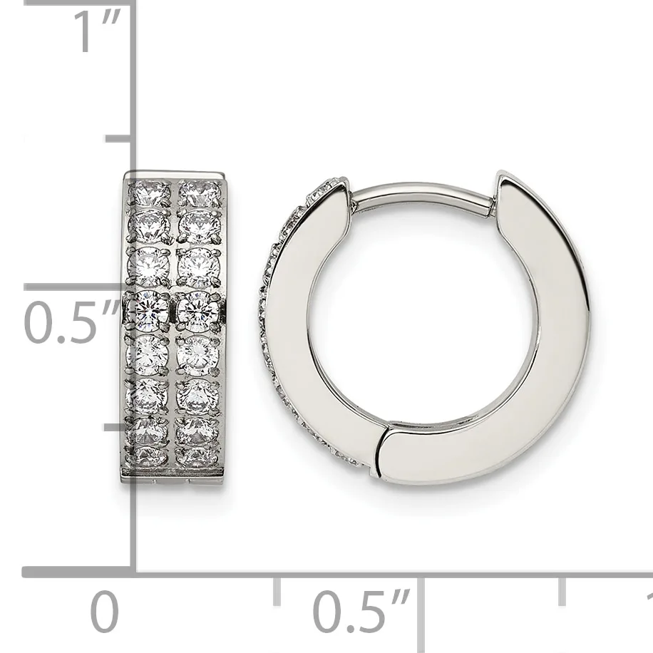 Pair of silver hoop earrings with cubic zirconia stones set in two columns on the front surface, shown with a measurement scale indicating approximately one inch in height.