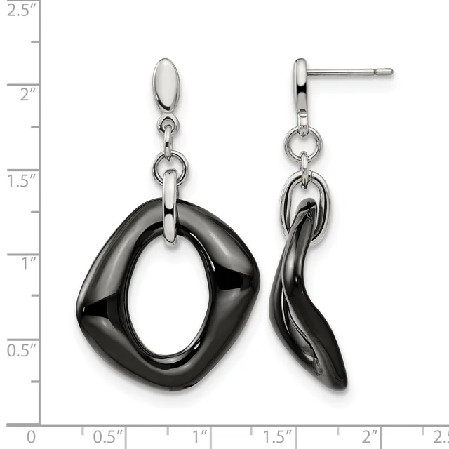 Pair of dangling earrings with polished black onyx oval links suspended from silver-tone oval posts, shown on a measurement scale indicating approximately two inches in length.