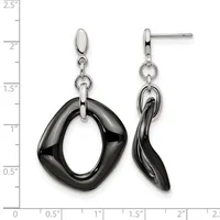 Pair of dangling earrings with polished black onyx oval links suspended from silver-tone oval posts, shown on a measurement scale indicating approximately two inches in length.
