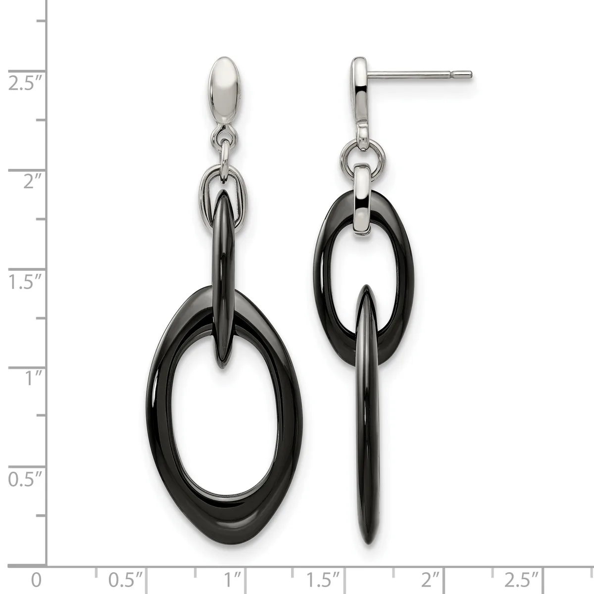 A pair of black and silver dangle earrings with oval black rings suspended from silver studs, displayed against a measurement scale showing approximately two inches in length.