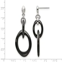 A pair of black and silver dangle earrings with oval black rings suspended from silver studs, displayed against a measurement scale showing approximately two inches in length.