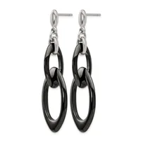 Pair of dangling earrings with stainless steel posts and black ceramic or resin interlocking oval links in graduated sizes.