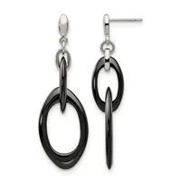 A pair of dangling earrings featuring black oval rings suspended from silver-toned post studs with connector loops.