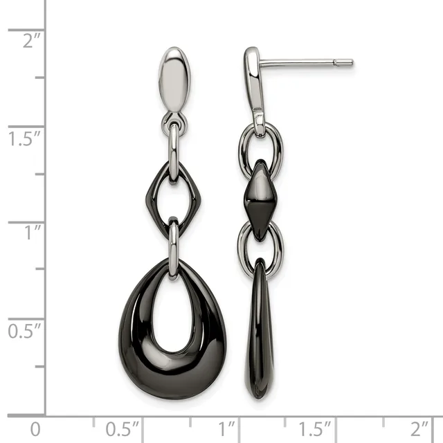 A pair of two-tone dangle earrings with polished silver posts and black teardrop-shaped links suspended above larger black teardrop pendants, displayed against a ruler showing approximately two inches in length.