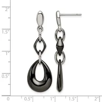 A pair of two-tone dangle earrings with polished silver posts and black teardrop-shaped links suspended above larger black teardrop pendants, displayed against a ruler showing approximately two inches in length.