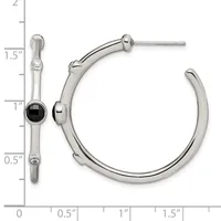 Silver hoop earrings with black onyx stone accents and small diamond details, shown at actual size on a measurement scale.