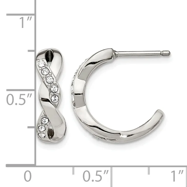 A pair of silver-toned curved hoop earrings with crystal accents arranged diagonally, shown against a measurement scale indicating approximately one inch in height.