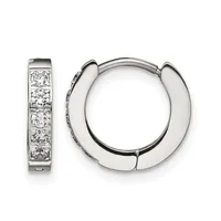 A pair of silver hoop earrings with one featuring a row of round diamonds set along the front and the other plain polished, shown from the front and side view.
