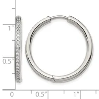 Silver hoop earrings with crystal pave detailing on one side, shown from front and side view with measurement scale.