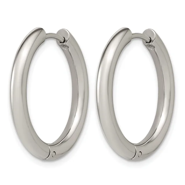 A pair of polished silver-toned chunky hoop earrings with hinged closures, displayed side by side against a white background.