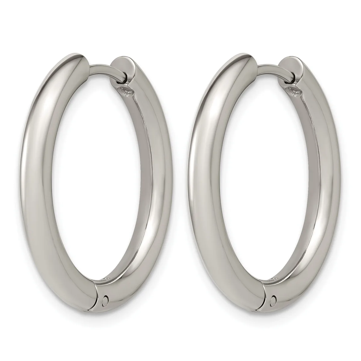 A pair of polished silver-toned chunky hoop earrings with hinged closures, displayed side by side against a white background.