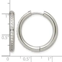 Silver hoop earrings with diamond accents along the front, shown with a measurement scale indicating approximately one inch in length.