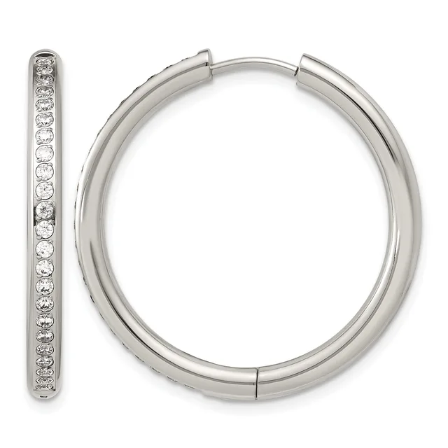 A pair of silver hoop earrings with a hinged closure, one earring displaying a row of round diamonds set along its outer edge.