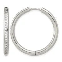 A pair of silver hoop earrings with a hinged closure, one earring displaying a row of round diamonds set along its outer edge.