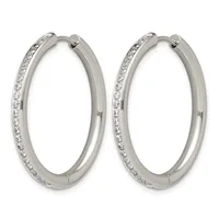 A pair of silver-tone hoop earrings with crystal rhinestones set along the outer edges, shown against a white background.