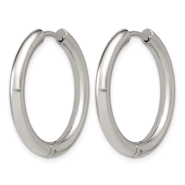 A pair of polished silver-toned chunky hoop earrings with hinged closures, displayed side by side against a white background.
