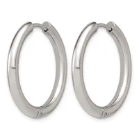 A pair of polished silver-toned chunky hoop earrings with hinged closures, displayed side by side against a white background.