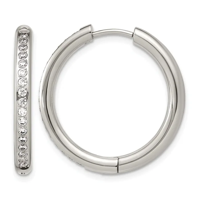 A pair of silver hoop earrings with hinged closures, one shown from the front and one displaying diamond or crystal stone settings along its inner surface.