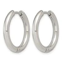 A pair of polished silver-toned chunky hoop earrings with hinged closures, shown from the front against a white background.