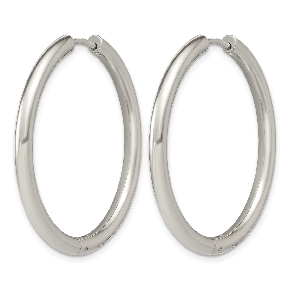 A pair of polished silver-toned hoop earrings with hinged closures, displayed side by side against a white background.