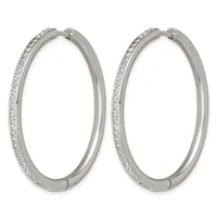 A pair of silver-toned hoop earrings with crystal or rhinestone embellishments along the outer edge, shown against a white background.