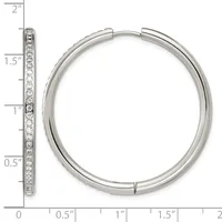 A silver hinge hoop earring with a row of round stones set along the front, displayed next to a ruler showing it measures approximately 1.5 inches in diameter.