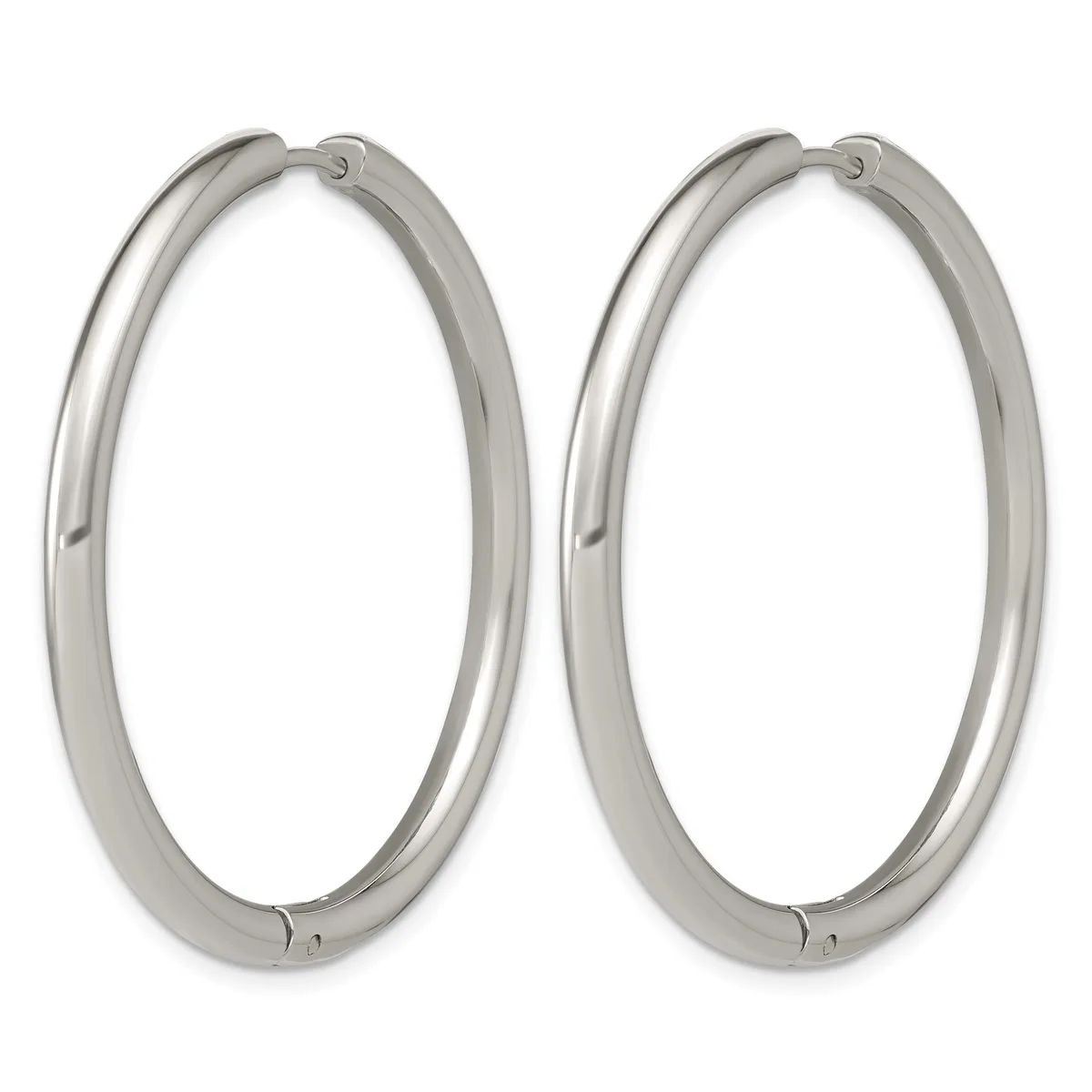 A pair of polished silver-toned oval hoop earrings with hinged closures, shown against a white background.