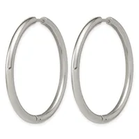 A pair of polished silver-toned oval hoop earrings with hinged closures, shown against a white background.