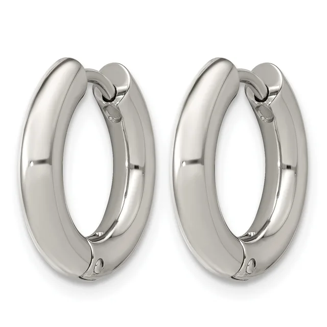 A pair of polished silver-tone chunky hoop earrings with a smooth, rounded profile and hinged closures, shown from the front.