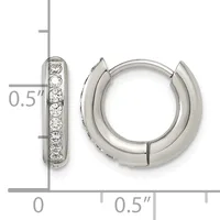 A pair of silver-toned hoop earrings with a measurement scale, one earring showing a row of round diamonds set along the inner edge, the other a plain polished hoop, each approximately half an inch in diameter.