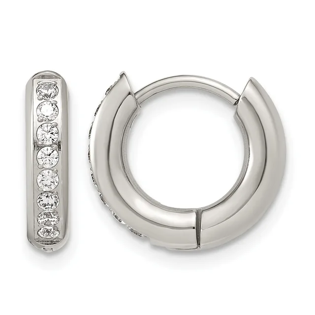 A pair of silver hoop earrings with a polished finish, one displaying a row of round brilliant-cut diamonds along the inner surface.